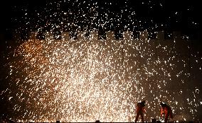 Folk Artists Perform Traditional Fireworks in Handan