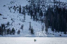 Lake Braies: Thin Ice Alerts Amid Mild Italian Winter