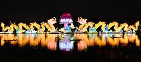 Tourists visit the 2024 Lunar Year Lantern Fair in Nanning