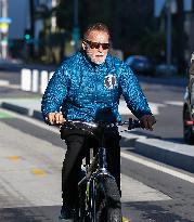 Arnold Schwarzenegger Rides His Bike - LA