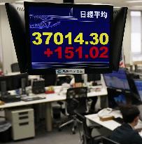 Nikkei index tops 37,000, 1st in 34 years