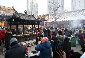 People Burn Incense Sticks at The Temple in Shenyang