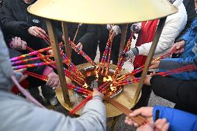 People Burn Incense Sticks at The Temple in Shenyang