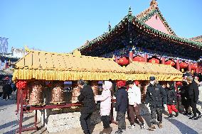 People Burn Incense Sticks at The Temple in Shenyang