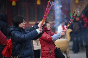 People Burn Incense Sticks at The Temple in Shenyang