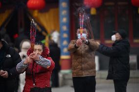 People Burn Incense Sticks at The Temple in Shenyang