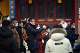 People Burn Incense Sticks at The Temple in Shenyang