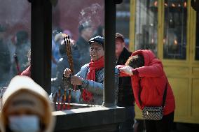 People Burn Incense Sticks at The Temple in Shenyang