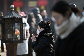 People Burn Incense Sticks at The Temple in Shenyang