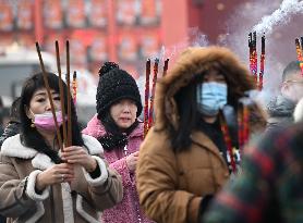 People Burn Incense Sticks at The Temple in Shenyang