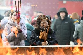 People Burn Incense Sticks at The Temple in Shenyang