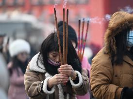 People Burn Incense Sticks at The Temple in Shenyang