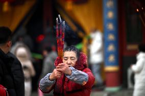 People Burn Incense Sticks at The Temple in Shenyang