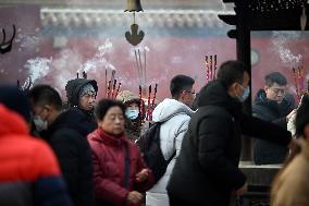 People Burn Incense Sticks at The Temple in Shenyang