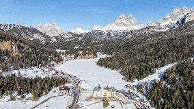 Drone View of Frozen Lake Misurina Covered in Snow