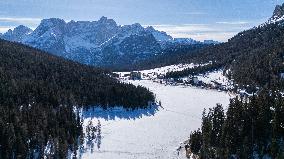 Drone View of Frozen Lake Misurina Covered in Snow