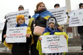 Families of Ukrainian military demand demobilisation in Kyiv