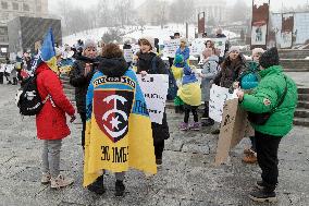 Families of Ukrainian military demand demobilisation in Kyiv