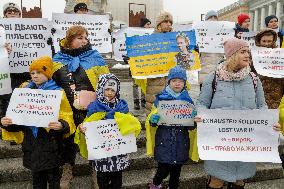 Families of Ukrainian military demand demobilisation in Kyiv