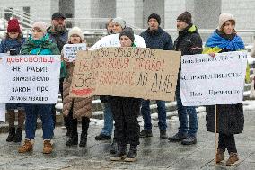 Families of Ukrainian military demand demobilisation in Kyiv