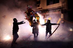 Artists Perform Firecracker Dragon to Celebrate Chinese Lunar Year in Liuzhou