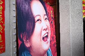 People Wait in Front of Movie Posters for the Lunar Year at A Cinema in Nanning