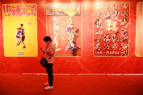People Wait in Front of Movie Posters for the Lunar Year at A Cinema in Nanning