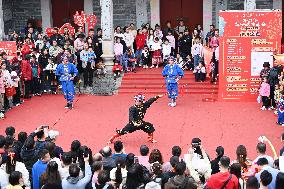 Tourists Watch A Folk Art Performance in Nanning