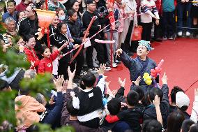 Tourists Watch A Folk Art Performance in Nanning