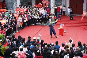 Tourists Watch A Folk Art Performance in Nanning