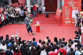 Tourists Watch A Folk Art Performance in Nanning