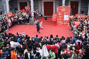 Tourists Watch A Folk Art Performance in Nanning