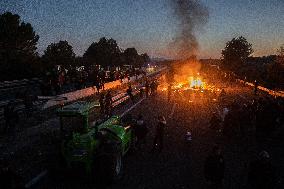 Catalan Farmers Block The AP-7 And N-2 Near The Border With France.