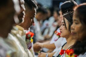 THE PHILIPPINES-CAVITE PROVINCE-VALENTINE'S DAY-MASS WEDDING