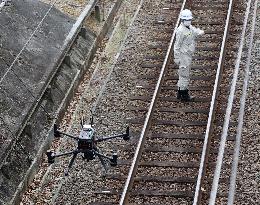 Drone inspects train rails