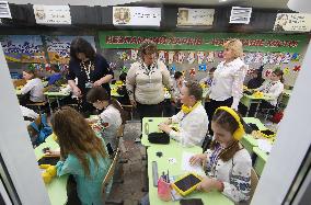 Kharkiv schoolgoers get laptops