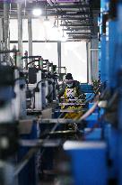 Workers Produce Electronic Components at  Workshop in Chongqing