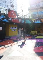 Young People Play Basketball at An Outdoor Street Basketball Court in Shanghai