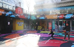 Young People Play Basketball at An Outdoor Street Basketball Court in Shanghai