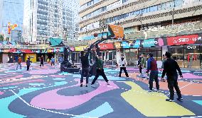 Young People Play Basketball at An Outdoor Street Basketball Court in Shanghai