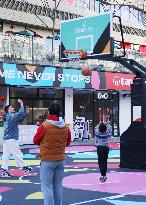 Young People Play Basketball at An Outdoor Street Basketball Court in Shanghai