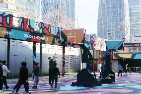 Young People Play Basketball at An Outdoor Street Basketball Court in Shanghai