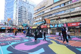 Young People Play Basketball at An Outdoor Street Basketball Court in Shanghai