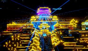 Tourists Visit The Brightly Lit Wanquan Right Guard City