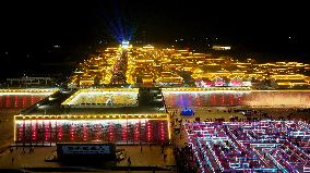 Tourists Visit The Brightly Lit Wanquan Right Guard City