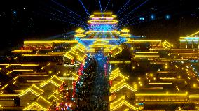 Tourists Visit The Brightly Lit Wanquan Right Guard City