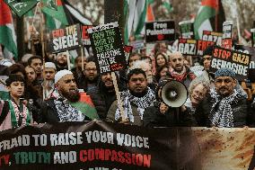 Tens Of Thousands At Pro-Palestinian March In London.