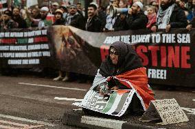 Tens Of Thousands At Pro-Palestinian March In London.