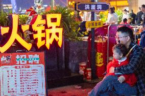 Tourists Visit A Food Street in Chongqing