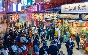Tourists Visit A Food Street in Chongqing